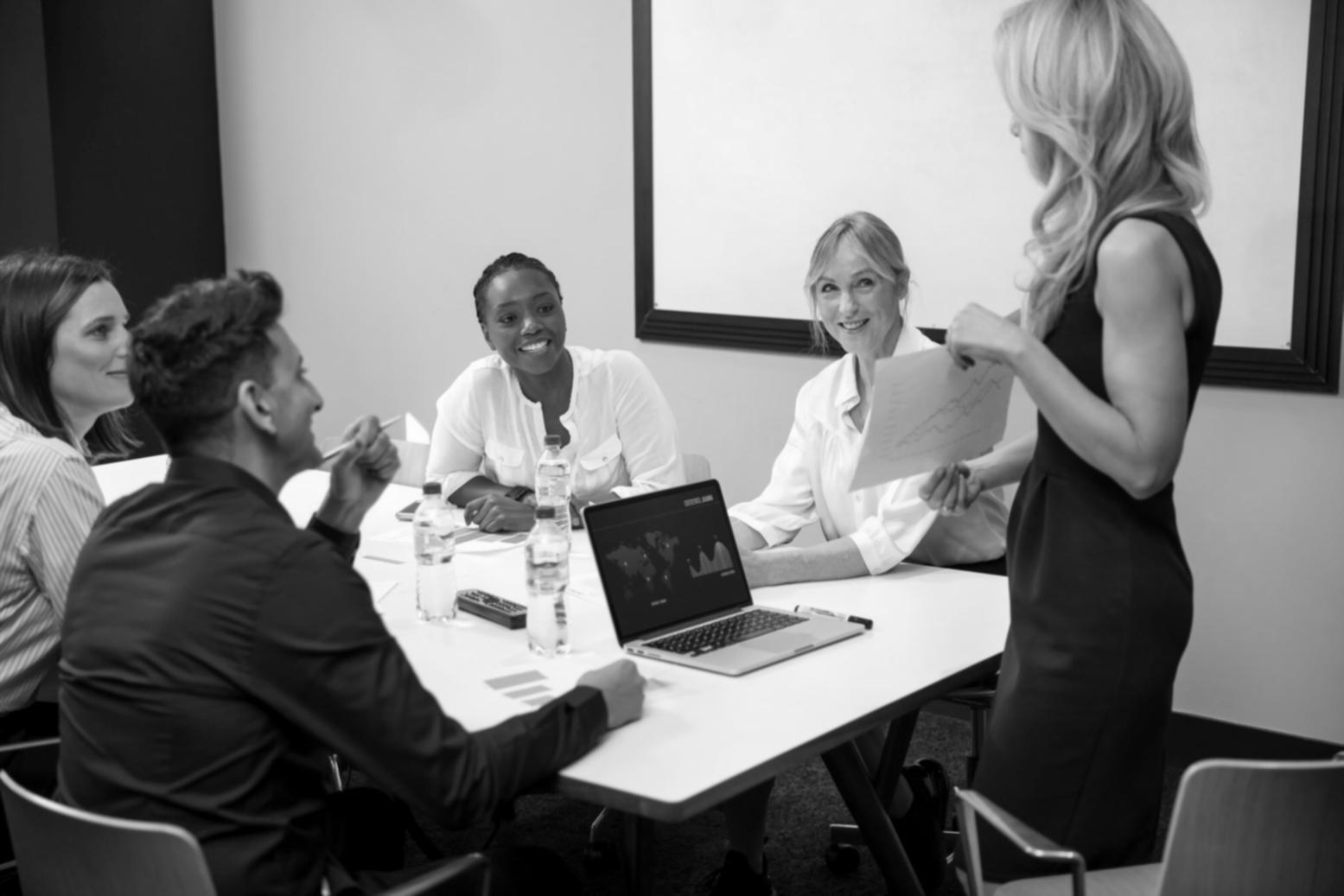 Students working on motion graphics projects in collaborative learning environment