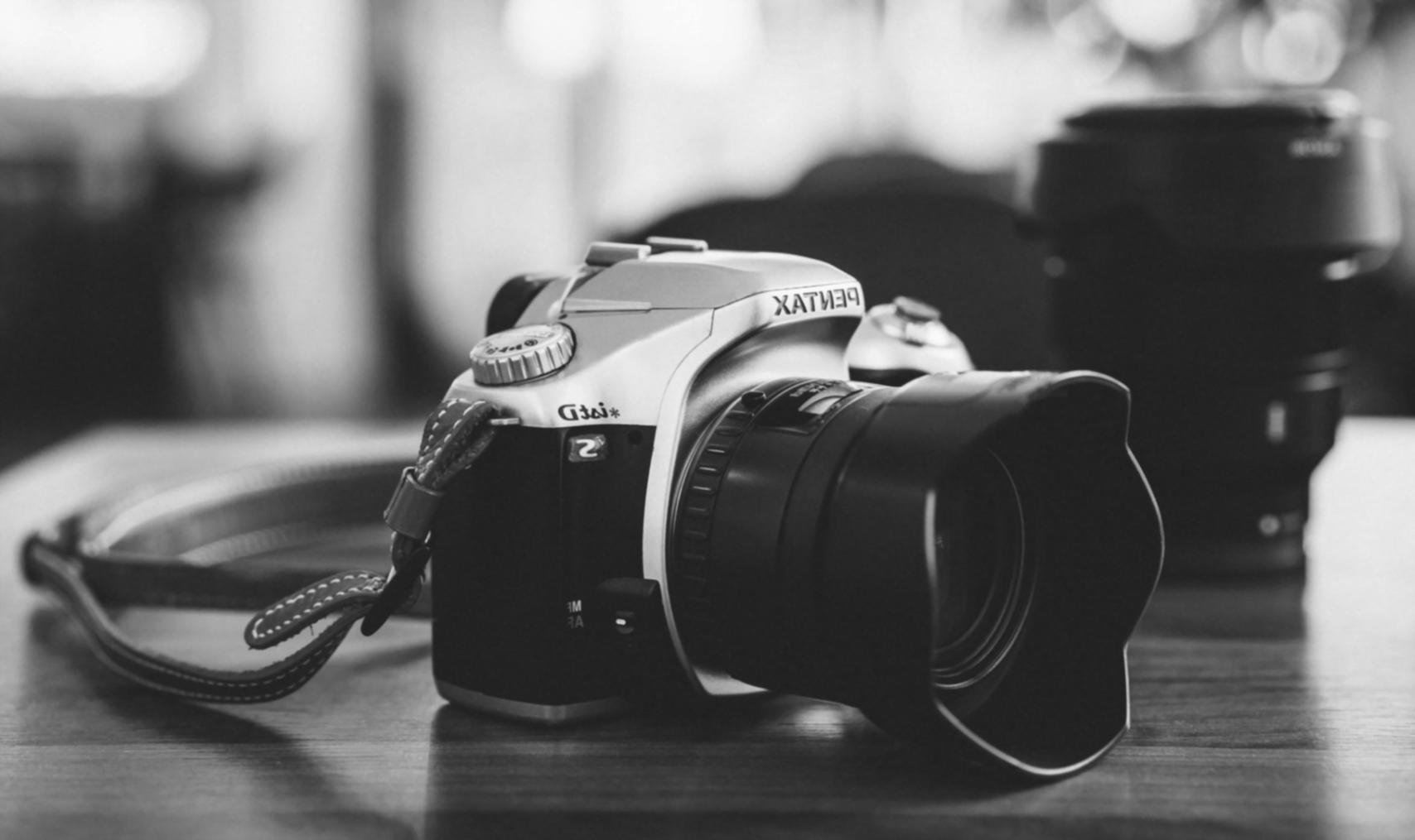 Motion graphics workspace showing creative design process with multiple screens displaying animated elements and design tools