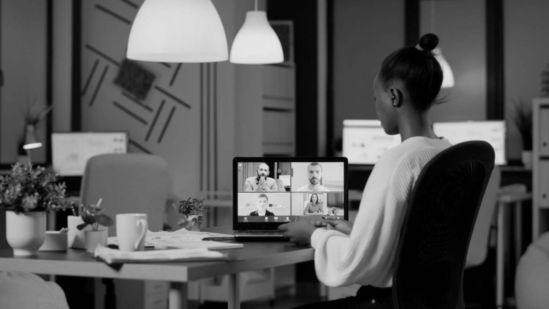 Modern creative studio environment with professional workstations and collaborative spaces